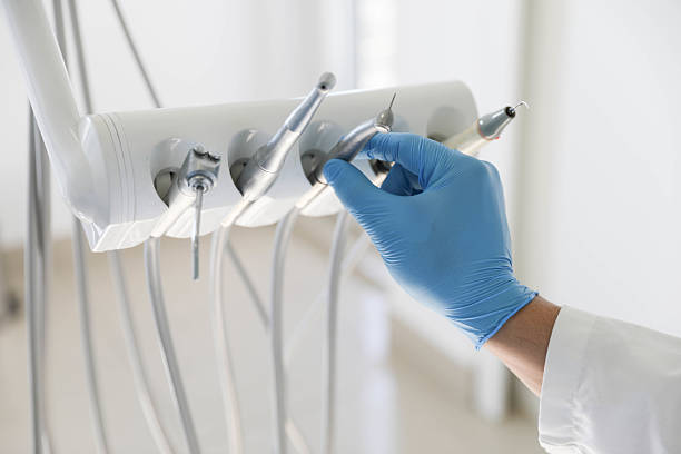 Professional Tooth Extraction technician working in Collinsville, OK